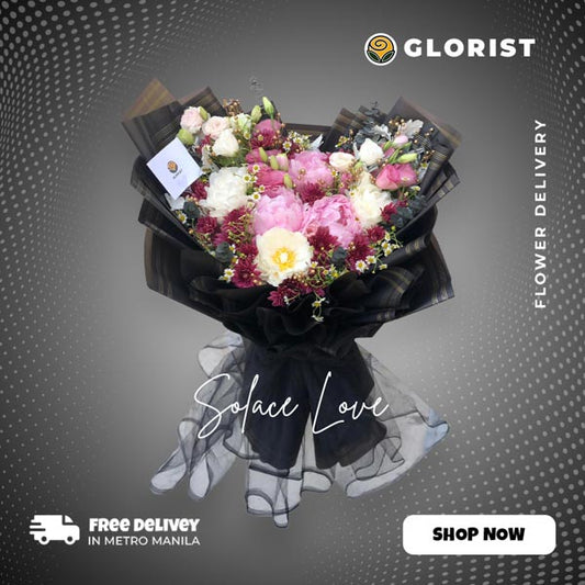 Captivating bouquet featuring white and pink peonies, jaguar, and lisianthus with eucalyptus, expertly arranged in a black Korean wrap and embellished with a luxurious black net. This stunning floral arrangement is perfect for any special occasion, adding beauty and charm to your celebrations.