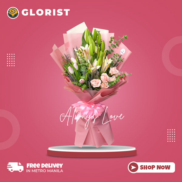 Captivating bouquet featuring mesmerizing stargazer lilies, elegant carnations, and exquisite roses, accompanied by lavender and eucalyptus fillers and expertly arranged in a Korean wrap and embellished with a luxurious satin ribbon. This stunning floral arrangement is perfect for any special occasion, adding beauty and charm to your celebrations.