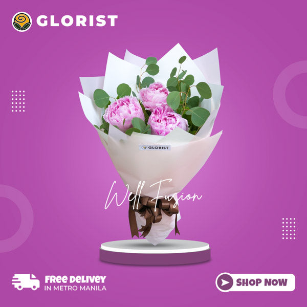 Exquisite bouquet of three purple peonies, artfully arranged with care and adorned with silver dollar leaves, elegantly wrapped in korean wrap and enhanced with a delicate satin ribbon, adding a touch of sophistication to this stunning floral arrangement.