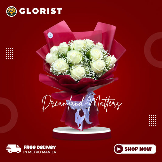 A striking bouquet featuring a vibrant arrangement of 12 white Ecuadorian roses, adorned with delicate gypsophila fillers. The bouquet is elegantly wrapped in red Korean-style packaging, enhanced with a luxurious white satin ribbon. This captivating floral ensemble is the perfect choice to convey joy and beauty for any special occasion.