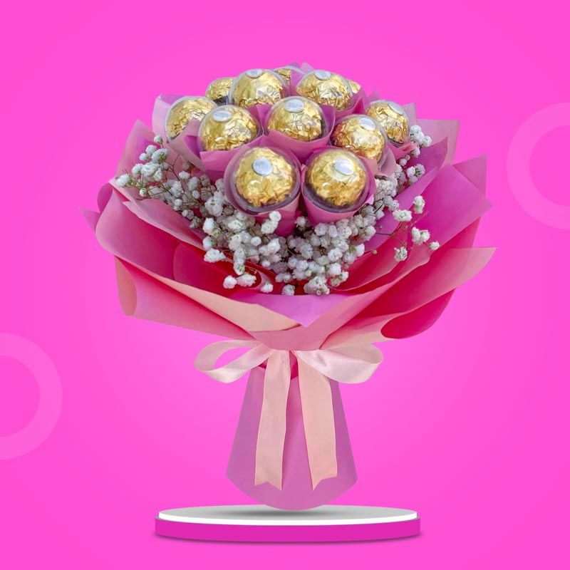 Beloved Sweets chocolate bouquet with Ferrero Rocher chocolates and baby’s breath in pink Korean wrap with light pink ribbon