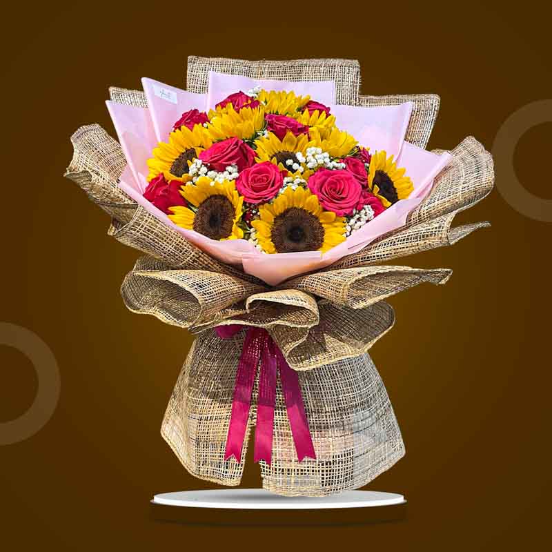 Bright Love bouquet with 12 sunflowers, 12 pink Ecuadorian roses, and gypsophila baby’s breath — wrapped in burlap and light pink Korean wrap, same-day delivery Manila