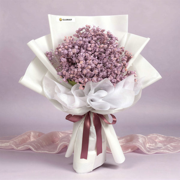 Captivating Snow bouquet with purple painted Gypsophila Baby’s Breath in white Korean wrap and old rose ribbon