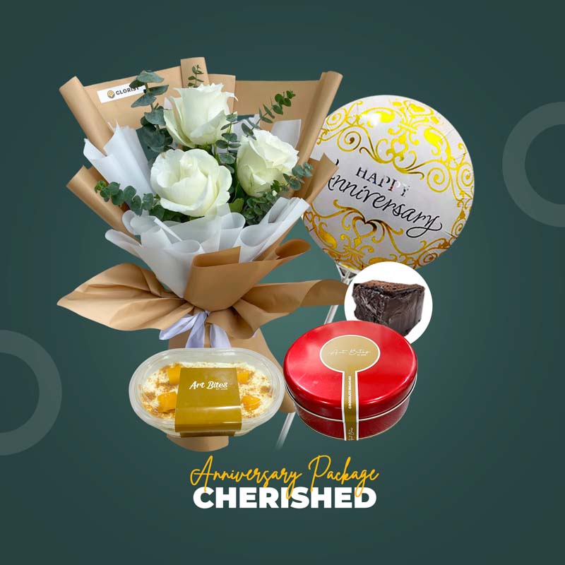 Cherished Anniversary Package with imported white rose bouquet, chocolate cake, mango tango, and anniversary balloon
