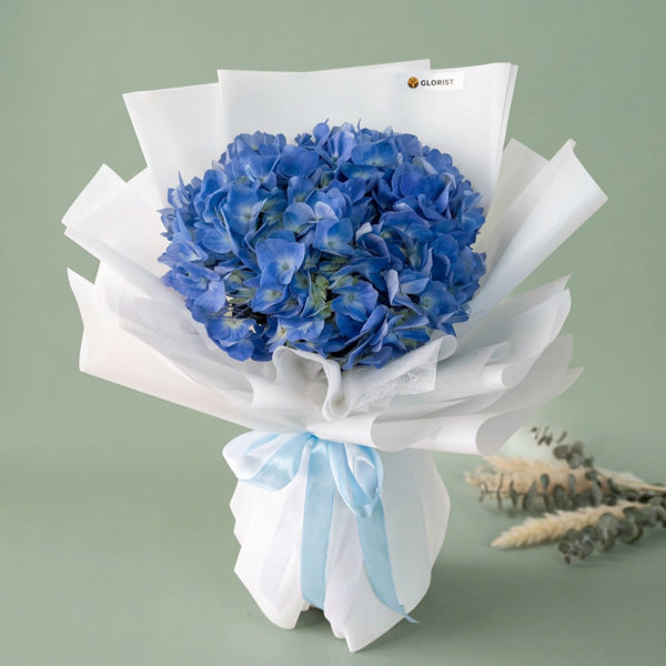 Couture Special Flower Bouquet featuring imported blue hydrangea with white Korean wrap and light blue ribbon for flower delivery in Metro Manila