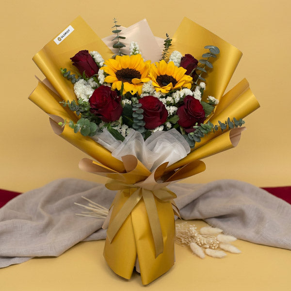 Sunflower and red China rose bouquet with eucalyptus and statice