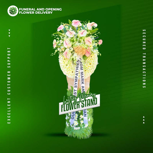 Lasting Memory Wreath Stand with 12 white anthuriums, 7 white gerberas, orchids and Malaysian mums accented by green line and anahaw leaves for Metro Manila memorials