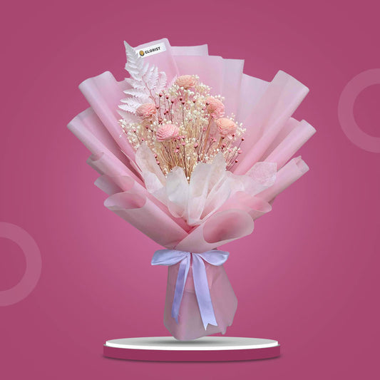 Morganite Timeless dried bouquet with 5 mini sola chrysanthemum, tiny star fillers (white & light pink), and white fern in light pink and white wrap with white ribbon