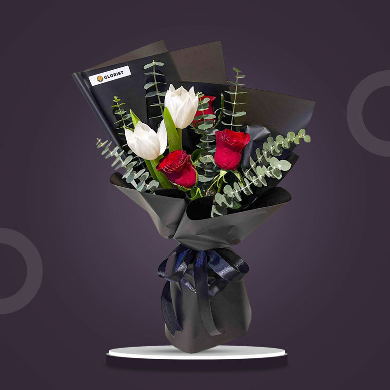Onyx Love bouquet with white tulips, red China roses, and eucalyptus Baby Blue, wrapped in black Korean paper with black ribbon — same-day delivery Manila
