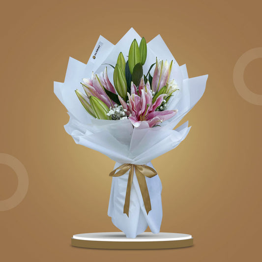 Romantic Breeze bouquet with 3 Stargazer lilies and gypsophila wrapped in white Korean paper with light gold ribbon