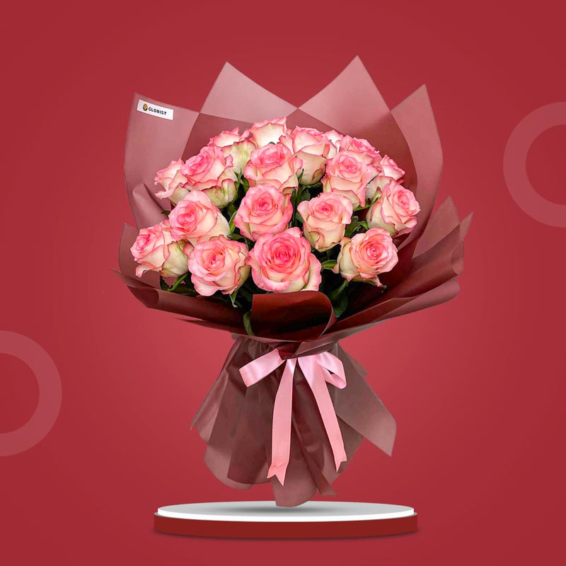 Shining Flora bouquet with 20 2‑toned light pink China roses in coffee‑maroon wrap tied with a medium‑pink ribbon
