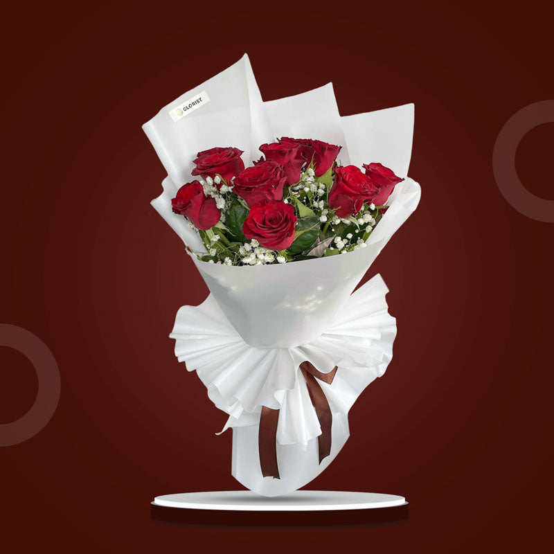 Sky Flora bouquet with 10 red China roses and gypsophila baby’s breath in white Korean wrap with brown ribbon