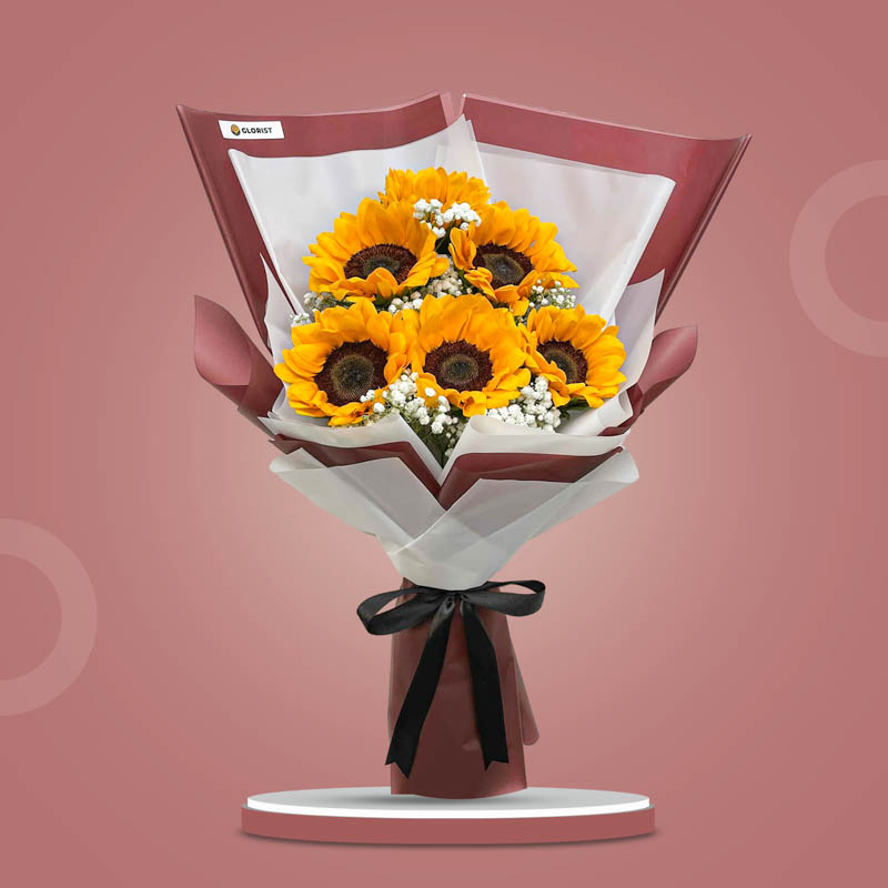 Steadfast Summer Flower Bouquet with six sunflowers and white baby’s breath wrapped in maroon and white Korean wrap with a black ribbon