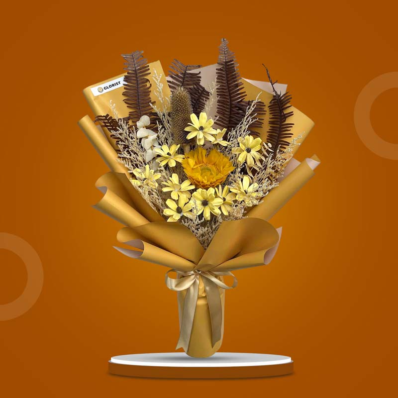 Topaz Timeless dried bouquet with sunflower, mini sola daisies, bleached eucalyptus, misty filler, skeletal fern in mustard wrap with light gold ribbon