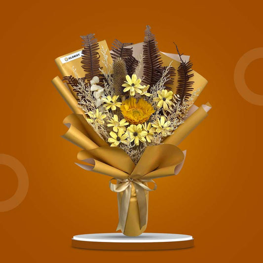 Topaz Timeless dried bouquet with sunflower, mini sola daisies, bleached eucalyptus, misty filler, skeletal fern in mustard wrap with light gold ribbon