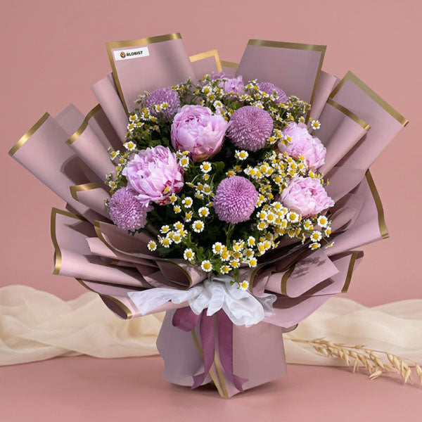Pink peony bouquet with pink pompoms and Korean-style wrappin