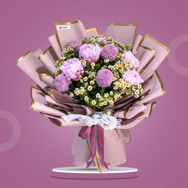 Tranquil Love bouquet with pink peonies, pink pompoms, and egg aster in dirty pink Korean wrap with gold lining — same-day delivery Manila
