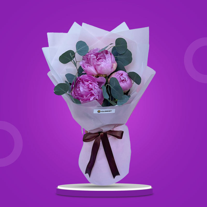 Well Fusion Flower Bouquet with 3 purple peonies, eucalyptus silver dollar, light violet Korean wrap, and brown ribbon