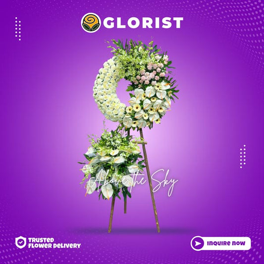 Graceful Sympathy Flower Stand: White and pink carnaions, anthurium, orchids, white gerbera daisies - A heartfelt tribute for moments of solace.