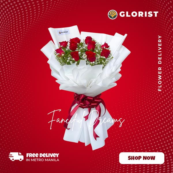 Fanciful Dreams: A best-selling bouquet featuring 1 dozen captivating red roses with delicate aster, elegantly wrapped in white Korean Film, creating a stunning display of romance and elegance.