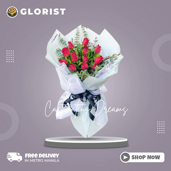 Elegant one dozen red roses with eucalyptus fillers in a Korean wrap, adorned with a satin ribbon for a touch of luxury.