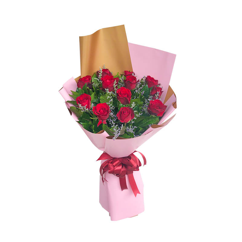 Precious Dreams: An exquisite arrangement adorned with 12 red roses, Rosal, and Misty Blue Fillers, creating a romantic ambiance.