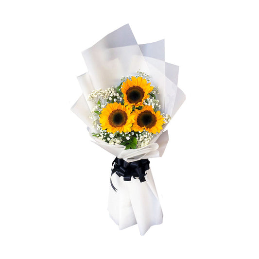 Vibrant 3 sunflower bouquet with delicate gypsophila fillers, presented in a stylish Korean wrap adorned with satin ribbon.