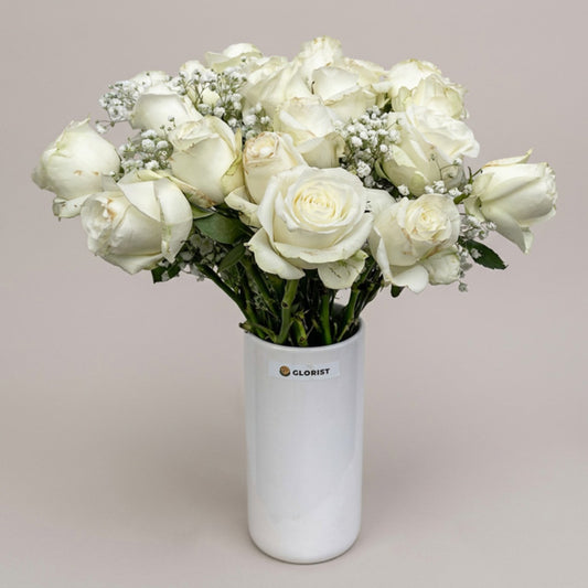 Twenty white China roses with gypsophila baby's breath in a white glass vase, elegant wedding and sympathy flower gift with same-day Metro Manila delivery