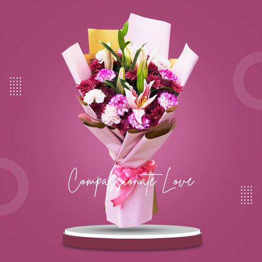 Captivating bouquet featuring two mesmerizing stargazer lilies, ten elegant carnations, and exquisite Malaysian mums, expertly arranged in a Korean wrap and embellished with a luxurious satin ribbon. This stunning floral arrangement is perfect for any special occasion, adding beauty and charm to your celebrations.