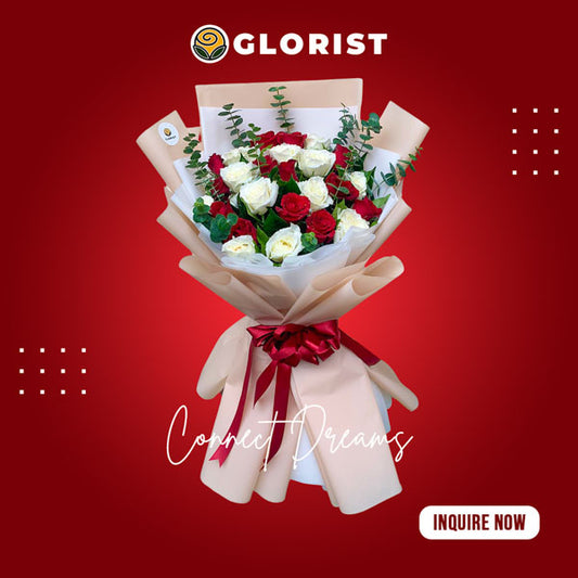 Captivating Bouquet of Red and White Roses complemented by delicate Eucalyptus Fillers, beautifully arranged in a Korean-style wrap and adorned with a luxurious Satin Ribbon.