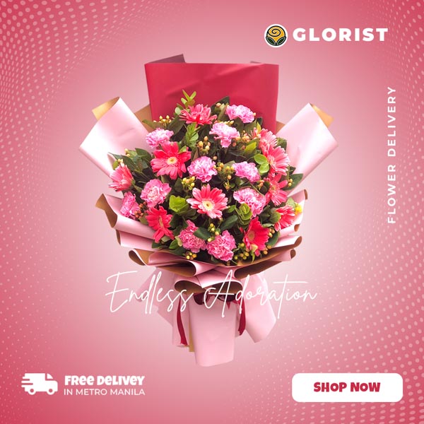 Captivating Floral Ensemble: Pink Gerberas, Light Pink Carnations, and Hypericum Berries Harmoniously Arranged in a Two-tone Korean Wrap, Enhanced with a Luxurious Satin Ribbon