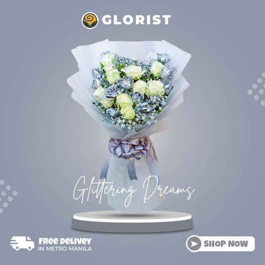 Glittering Dreams: An exquisite arrangement featuring white and floral painted silver Baguio roses, complemented by gypsophila fillers, creating a stunning display of elegance and beauty.