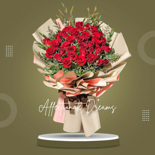 Affectionate Dreams: An exquisite arrangement adorned with 36 red roses and Misty Blue Fillers, creating a romantic ambiance.