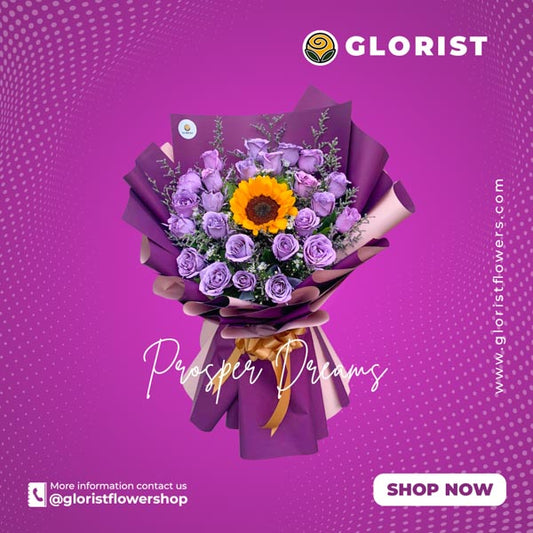 Captivating bouquet: Two dozen purple roses with floral paint centered is 1 Sunflower nestled amongst Misty Blue Fillers, beautifully wrapped in a two-tone design and tied with satin ribbon.