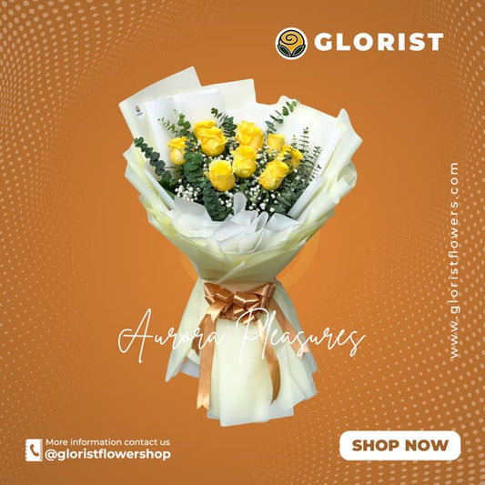 Captivating bouquet of Yellow Roses complemented by delicate eucalyptus and gypsophila fillers, beautifully arranged in a white Korean-style wrap and adorned with a luxurious Satin Ribbon.