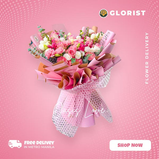 Captivating bouquet featuring light pink china rose and carnation, white rose, snapdragon with eucalyptus fillers, expertly arranged in a Korean wrap and embellished with a luxurious net. This stunning floral arrangement is perfect for any special occasion, adding beauty and charm to your celebrations.