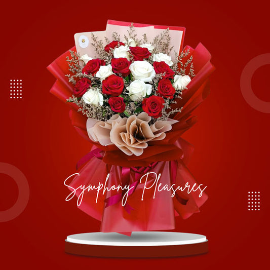 Captivating Bouquet of Red and White Roses complemented by delicate Misty Blue Fillers, beautifully arranged in a Korean-style wrap and adorned with a luxurious Satin Ribbon.