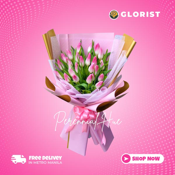 Gorgeous bouquet of two dozen pink tulips with statice fillers. Tissue wrap adorned with net, exuding natural beauty and charm.