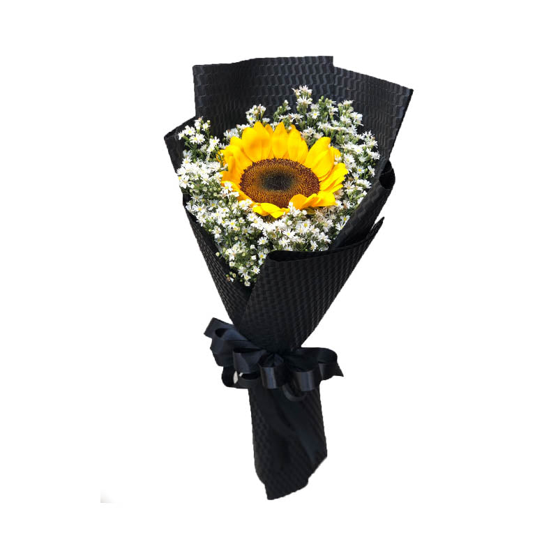 Radiant sunflower centerpiece: A single sunflower with Aster fillers, beautifully wrapped in Korean style with a satin ribbon, exuding natural charm.
