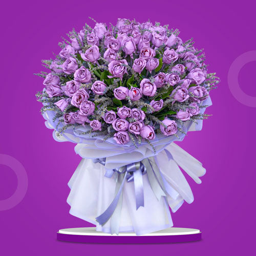 99 floral painted purple roses with Misty Blue bouquet in Korean wrap with satin ribbon. Impressive and passionate arrangement for special occasions. Flower delivery in Makati, Pasay, Cavite, and Rizal.