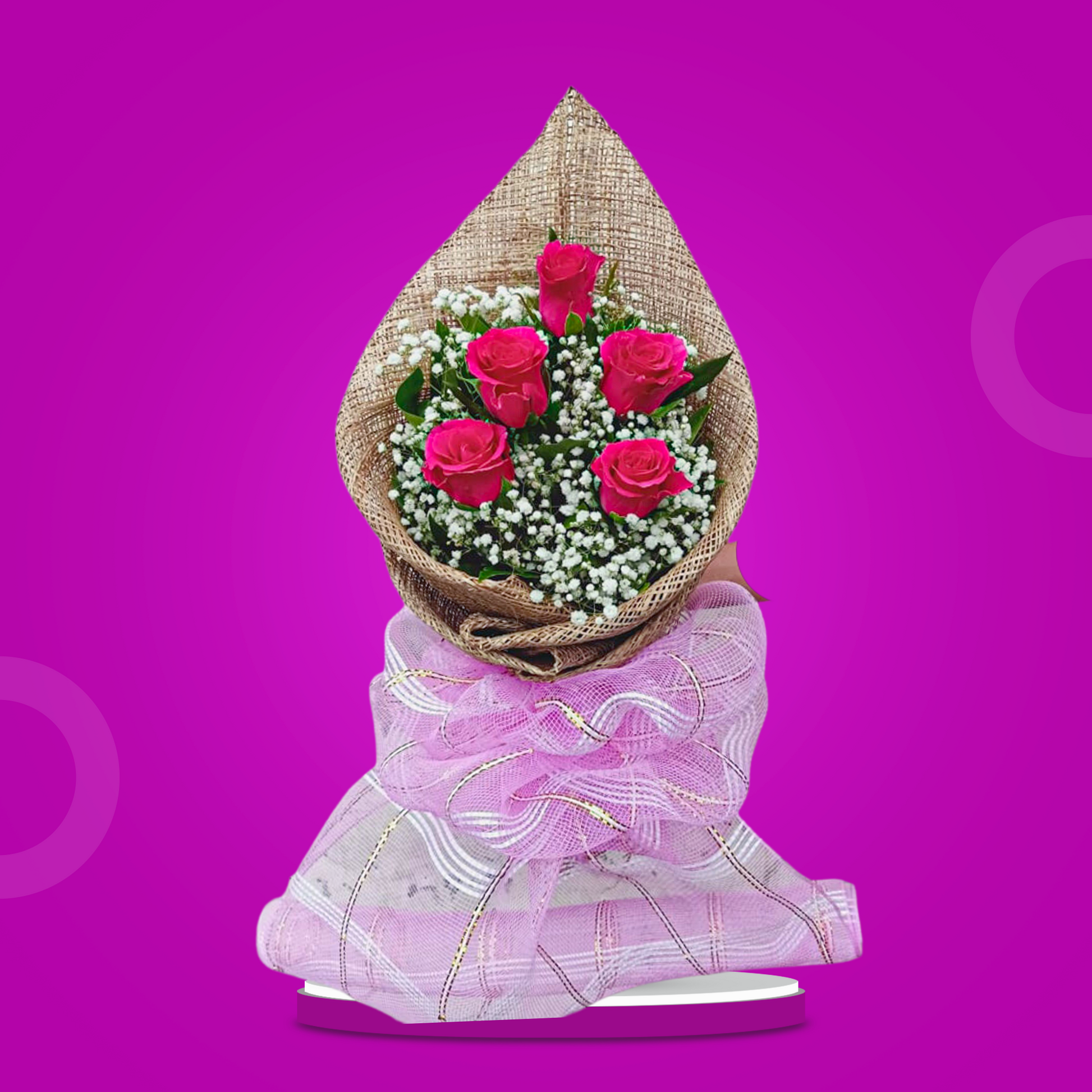 Dreamland Excitement bouquet featuring 5 Dark Pink Ecuadorian Roses with Gypsophila fillers wrapped in rustic burlap and net.