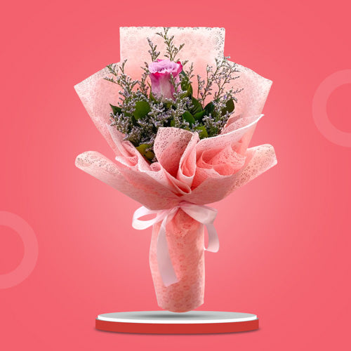 Single light pink Ecuadorian rose with misty blue fillers in light pink tissue wrapping and satin ribbon - elegant flower arrangement for special occasions - flower delivery in Bulakan, Bulacan