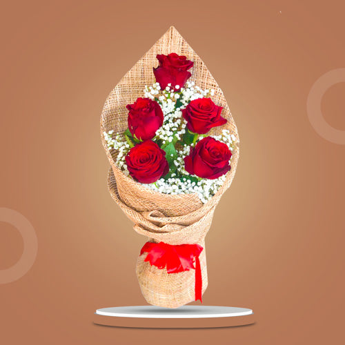 Dreamland Snow Flower Bouquet featuring elegant Ecuadorian roses and delicate gypsophila baby’s breath in a timeless, graceful arrangement.
