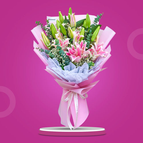 Enthusiasm Breeze Bouquet featuring stargazer lilies, misty white fillers, and eucalyptus in a Korean-style wrap.
