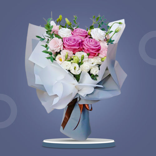 Captivating bouquet featuring 3 purple Ecuadorian roses and lisianthus in Korean wrap with brown satin ribbon - stunning flower arrangement for special occasions - flower delivery to Vista Mall Malolos and SM City Baliwag