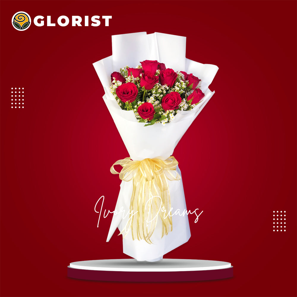 Classic Bouquet: Vibrant Red Roses, Aster Fillers, White Korean-style wrap, Organza Ribbon - A timeless symbol of love and elegance.