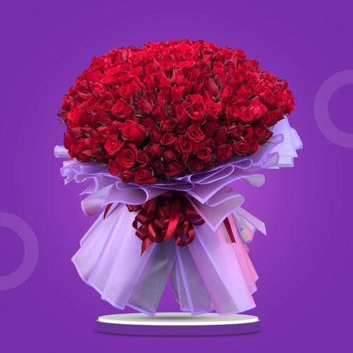 One Year Love Bouquet featuring 365 radiant red roses, symbolizing a year of love and devotion, crafted into an opulent and stunning arrangement.