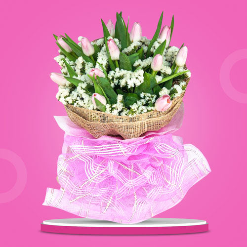 Gorgeous bouquet of one dozen pink tulips with statice fillers in tissue and burlap wrap with net - natural beauty and charm - flower delivery to Vista Mall Las Piñas and SM San Lazaro