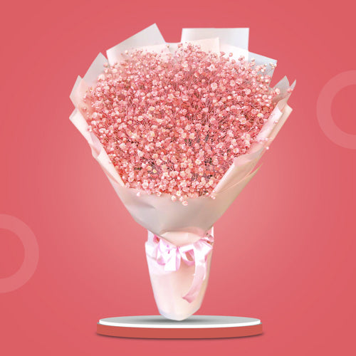 Pink Snow Bouquet featuring pink gypsophila with floral paint in a romantic and captivating floral arrangement.