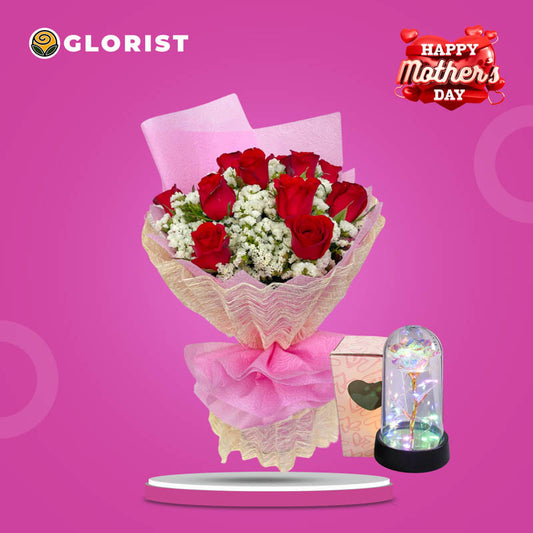 SNOW Flower Bouquet with 12 red roses, white statice, light pink tissue, cream abaca wrap, and Free Eternal Dome Light